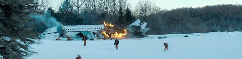 Akční thriller Cold Zero o havárii letadla v mrazivé divočině napíše tvůrce Temného případu